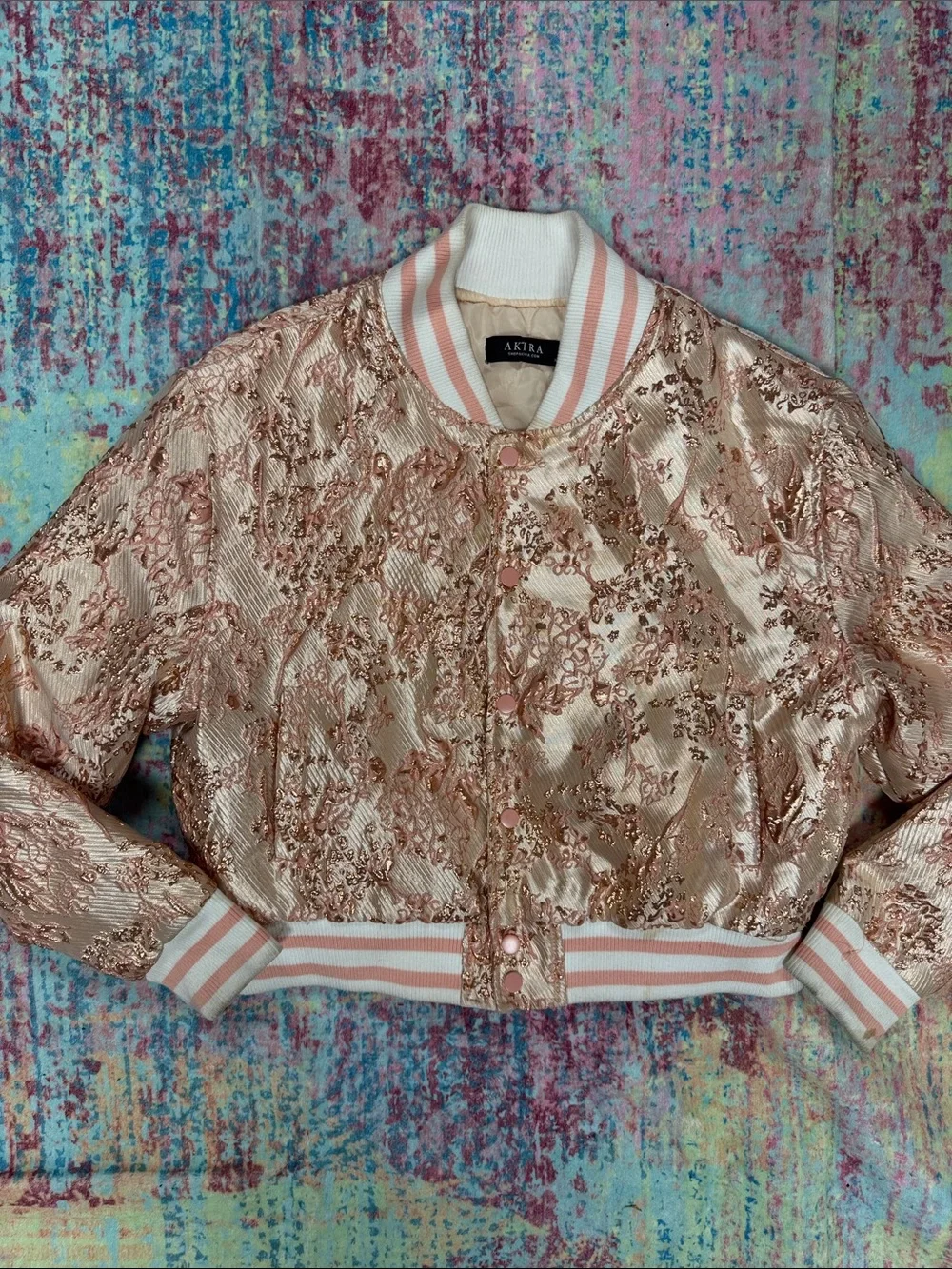 AKIRA Rose Gold Metallic Bomber Jacket with Blush Trim
